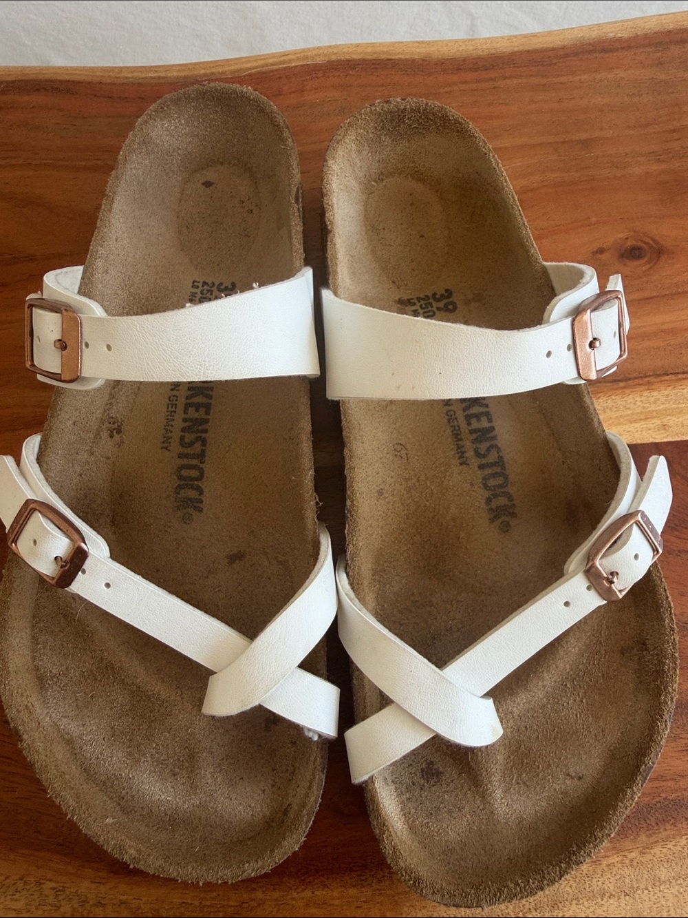 Birkenstock White Leather Gizeh Cross-Strap Sandals with Rose Gold Buckles